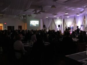 Project R12 event with speakers on the stage and a listening crowd, 660 LaFayette Street, Horton Events Downtown Nashville Project R12 event with speakers on the stage and a listening crowd, 660 LaFayette Street, Horton Events Downtown Nashville