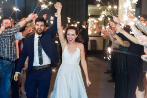 Happy couple running through sparklers. The Fletcher Wedding Zach Harrison Photography - Horton Events Downtown Nashville Happy couple running through sparklers. The Fletcher Wedding Zach Harrison Photography - Horton Events Downtown Nashville