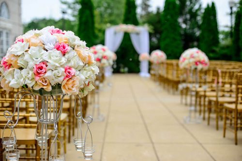 Outdoor wedding isle, wedding flower bouquet candle decoration, and an alter. Wedding Venue, Horton Events Nashville