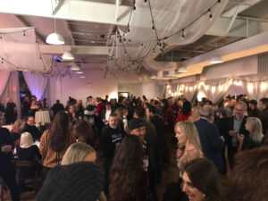 BMG-BR Nashville holiday party at Horton Events Downtown in the main room, lots of people standing around talking