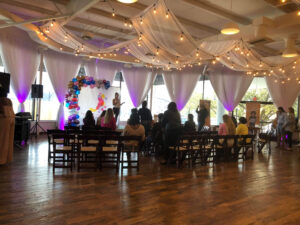 Fitness speaker on a small stage, Ladies Lifestyle Affair - Horton Events Downtown Nashville