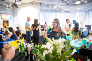 Whiskey Wine and Whiskers 2024 (5) Beautiful girl smiling while sampling beverage